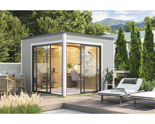 Modernes Gartenhaus mit Schiebetüren und Büroeinrichtung