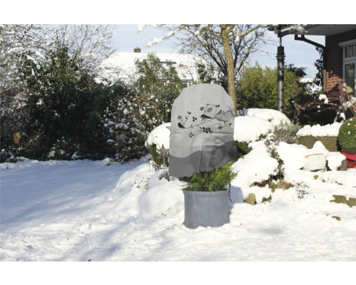 Pflanzenschutzhaube mit Vogelmotiv im verschneiten Garten