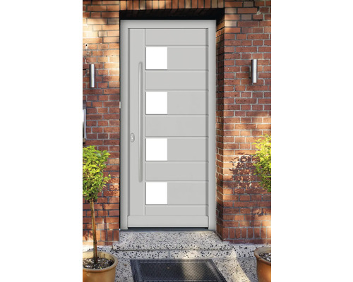 Moderne Haustür mit Glaseinsätzen und Edelstahlgriff in einer Backsteinmauer