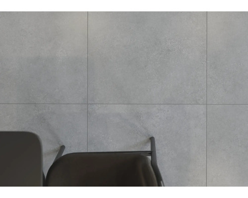 Graue Fliesen mit Stuhl und Tisch von oben