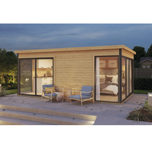 Modernes Gartenhaus mit Küche und Schlafzimmer sowie Sitzbereich im Freien