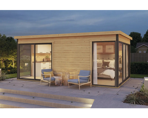 Modernes Gartenhaus mit Küche und Schlafzimmer sowie Sitzbereich im Freien