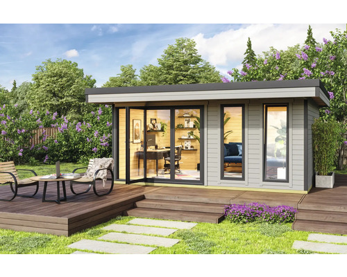 Modernes Gartenhaus mit Terrasse und Büromöbeln in grüner Umgebung