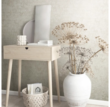 Dekoratives Zimmerambiente mit Konsole, Korb, Vase und Wohnaccessoires