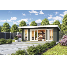 Gartenhaus mit Büroausstattung im Außenbereich auf Rasenfläche.