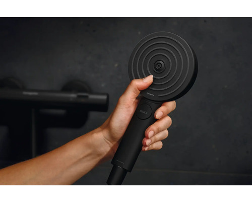 Handbrause mit Strahlartenumstellung in der Hand