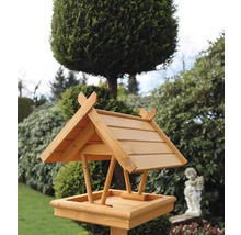 Vogelhaus aus Holz mit Dach im Garten
