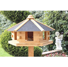 Vogelhaus aus Holz mit Ständer im Garten