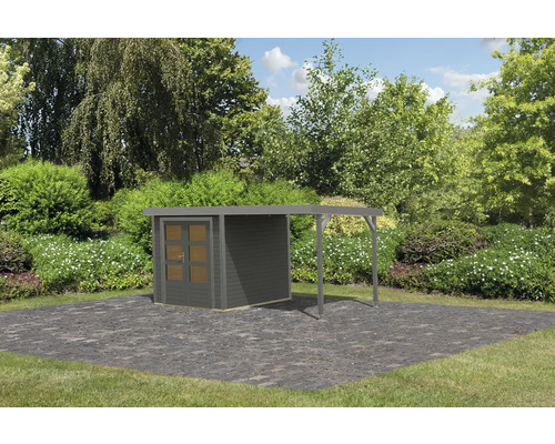 Gartenhaus mit Anbau im Garten auf Steinboden