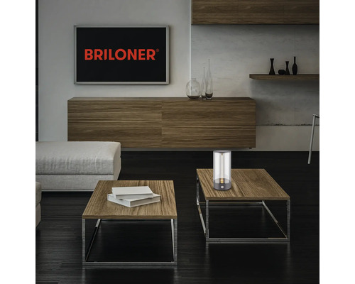 Wohnzimmer mit Couchtisch und Briloner Tischleuchte