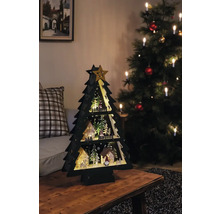 Dekorativer Weihnachtsbaum aus Holz mit LED Beleuchtung auf einem Tisch