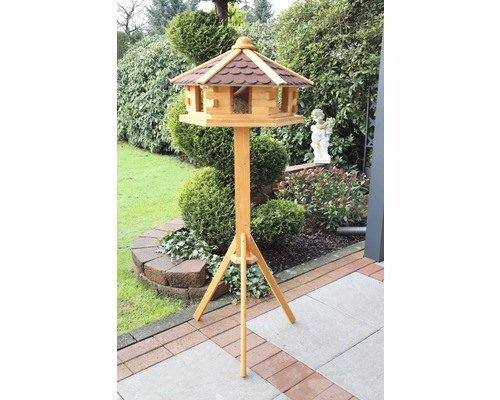 Vogelhaus mit Ständer im Garten