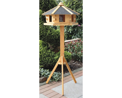 Vogelhaus aus Holz mit Ständer im Garten