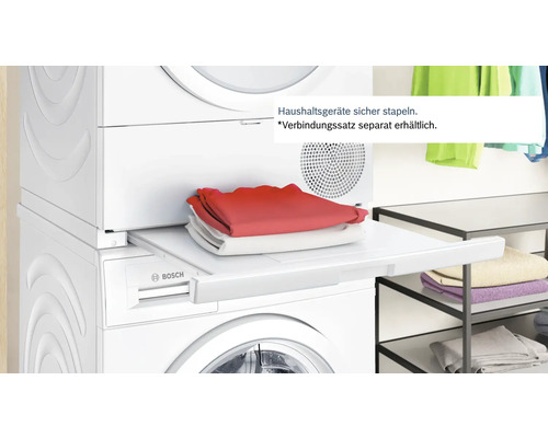Waschmaschine und Trockner mit ausziehbarer Arbeitsplatte und Bosch Logo.