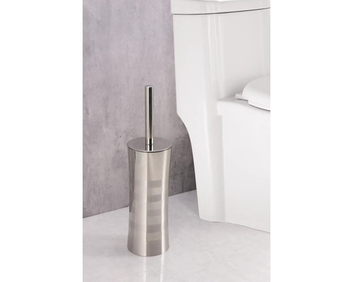 Toilettenbürste aus Metall mit Halter neben Toilette