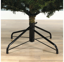 Detailaufnahme des Standfußes eines künstlichen Weihnachtsbaums.