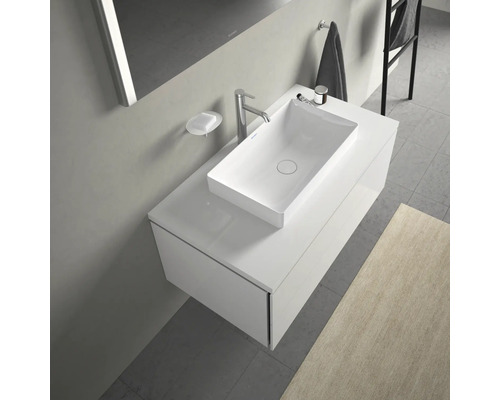 Modernes Badezimmerwaschbecken mit Unterschrank, Armatur und Seifenschale.