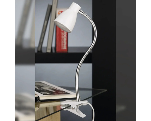 Schreibtischlampe mit Klemme und flexiblem Arm auf einem Tisch mit Buch