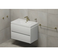 Modernes Badezimmer mit weißem Waschtischunterschrank, Aufsatzwaschbecken und goldenen Armaturen