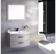 Modernes Badezimmer mit Waschtisch, Spiegel und Dusche.