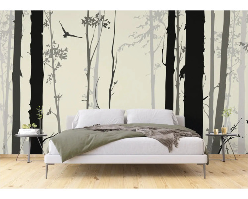 Schlafzimmer mit einer Fototapete mit Waldmotiv und Vogel
