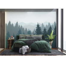 Schlafzimmer mit Waldtapete, Bett und Nachttisch