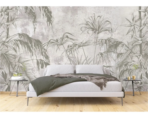 Schlafzimmer mit Wandtapete mit Dschungelmotiven