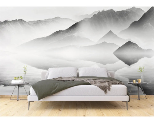 Schlafzimmer mit Fototapete Berglandschaft über dem Bett