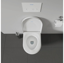 Aufnahme von oben einer Toilette mit Spülkasten und Toilettenpapierhalter