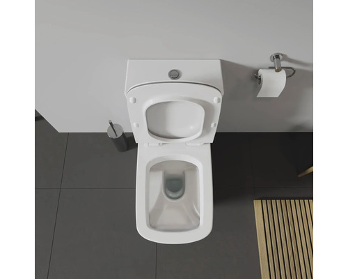 Aufnahme von oben einer Toilette mit offenem Deckel im Badezimmer