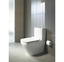 Stand-WC in einem Badezimmer mit Fliesen.