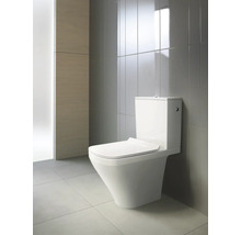 Keramik Toilette im Badezimmer mit Fliesen
