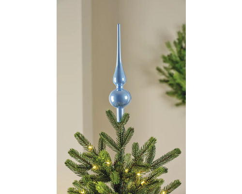 Blauer Christbaumspitzenschmuck auf einem Weihnachtsbaum