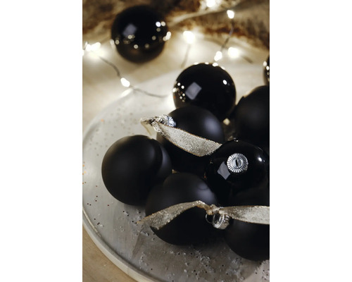 Dekorative Weihnachtskugeln in Schwarz mit Bändern