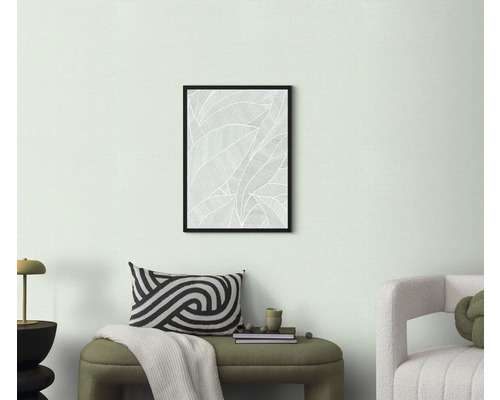 Wohnzimmerdekoration mit gerahmtem Blattmusterbild