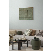 Wohnzimmer mit Sofa, Kissen, Couchtisch und Wanddekoration für eine gemütliche Atmosphäre