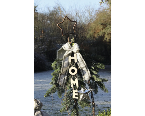 Dekorativer Weihnachtsbaum mit Schleife, Stern und dem Schriftzug HOME