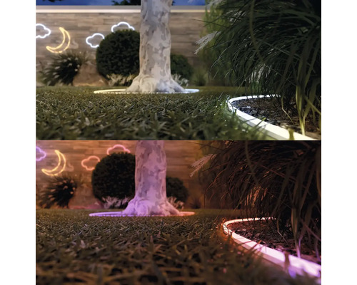 Gartenlandschaft mit Rasen, Bäumen, Büschen und dekorativer Beleuchtung