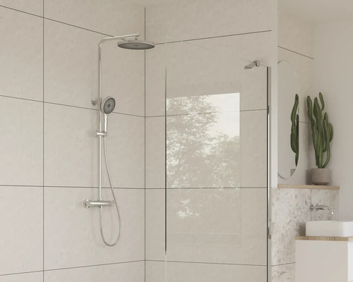 Duschset mit Duschabtrennung und Waschbecken im Badezimmer