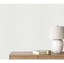 Nahaufnahme einer weißen Strukturtapete an einer Wand