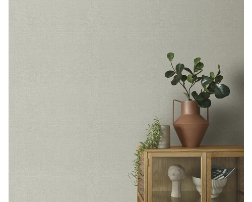 Nahaufnahme einer Wand mit Textiltapete in Leinwandoptik