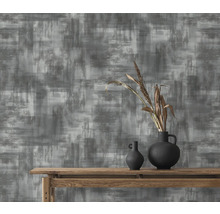 Dekorative Tapete mit abstraktem Muster in Grau und Weiß.