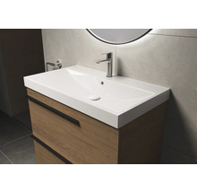 Waschtischunterschrank mit Waschtisch und Armatur im Badezimmer