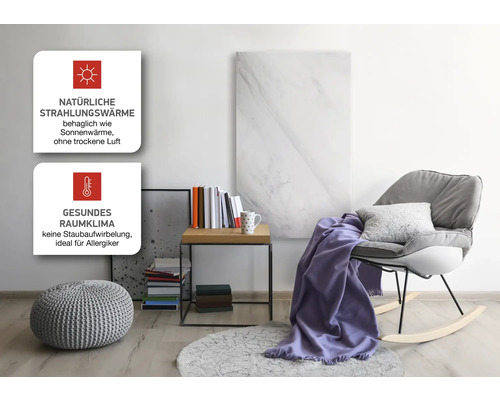 Wohnzimmer mit Infrarotheizungspaneel, Sessel, Beistelltisch und Dekoration