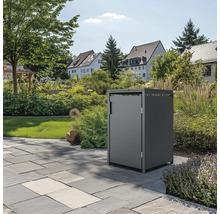Mülltonnenbox im Garten auf Steinfliesen