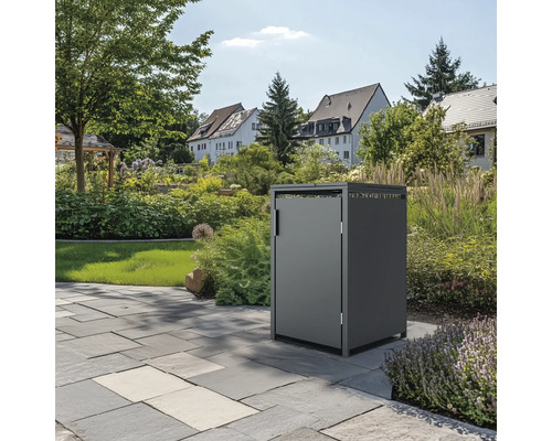 Mülltonnenbox im Garten auf Steinfliesen
