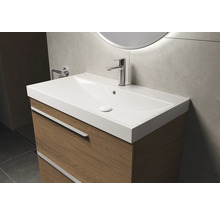 Waschtischunterschrank mit Waschbecken und Armatur im Badezimmer.