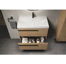 Waschtischunterschrank aus Holz mit offenem Schubfach im Badezimmer