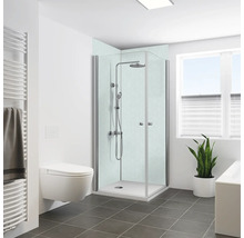 Helles Badezimmer mit Dusche, Toilette, Heizkörper und Pflanze