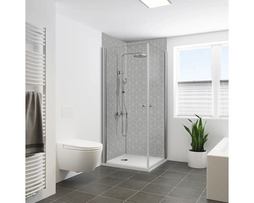 Badezimmer mit Eckdusche, Toilette und Heizkörper